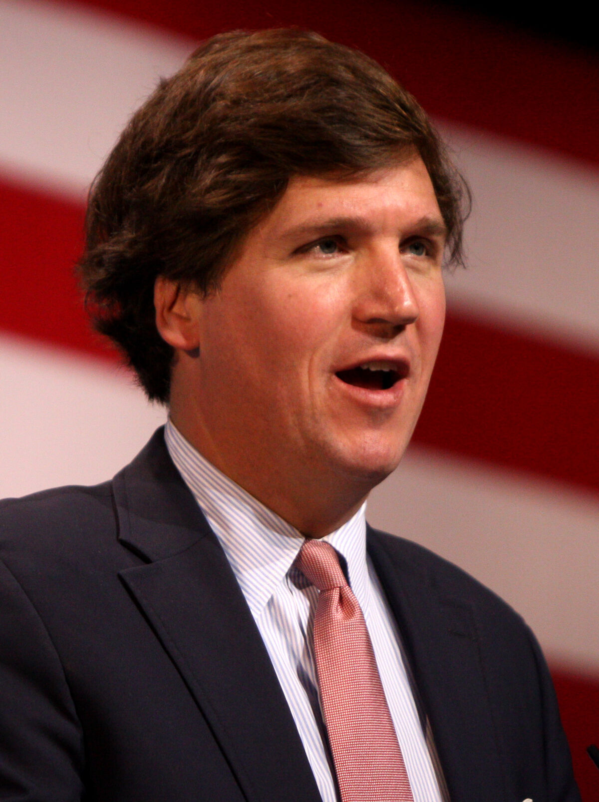 Tucker Carlson speaking at CPAC